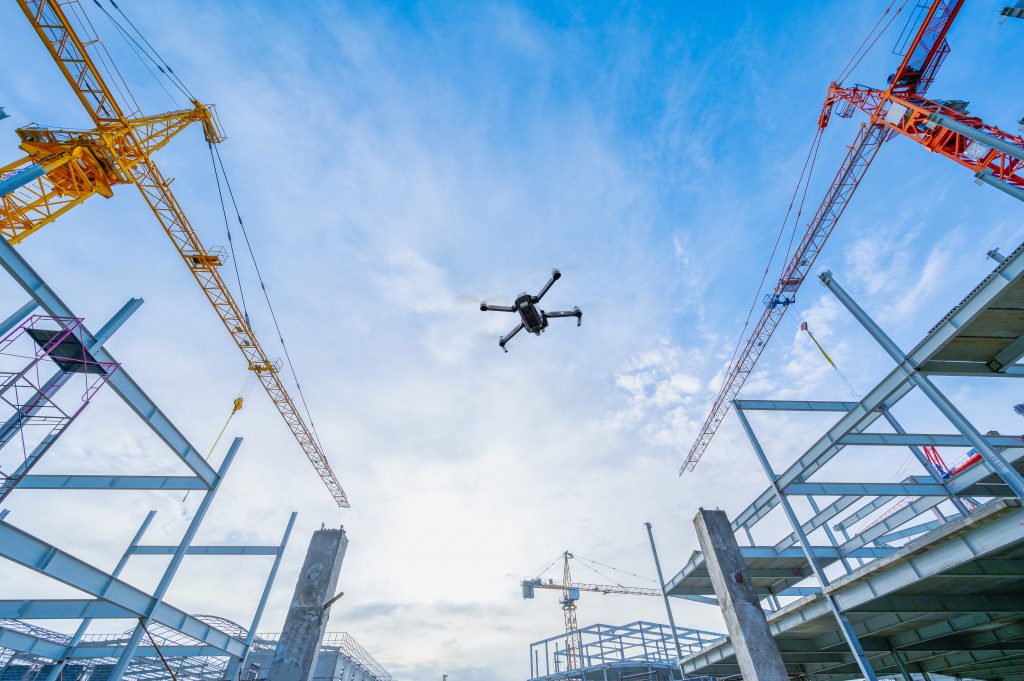 Industry-Drone over construction site. video surveillance or industrial i